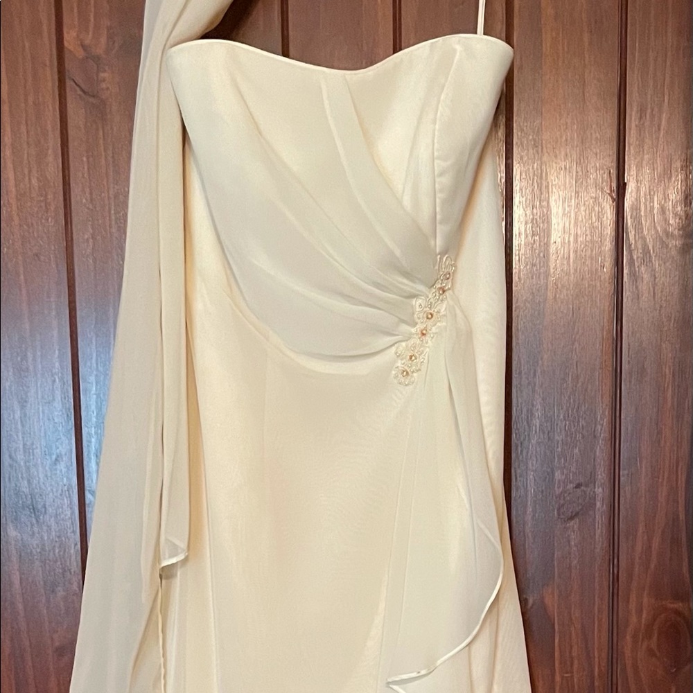 Formal gown, strapless, yellow.  Some beading.